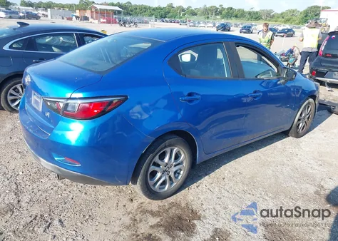 2018 Toyota Yaris Ia из США, поврежденный, VIN 3MYDLBYV2JY307716